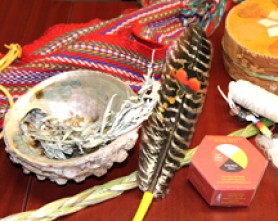 eagle feather, sweet grass and other indigenous toolkit items