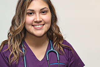 smiling nurse with stethoscope