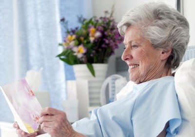 patient reading a greeting card